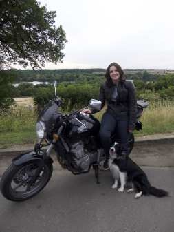 Natalia posing with her Honda CBF500 wearing her new Knox jeans and Dainese leather jacket